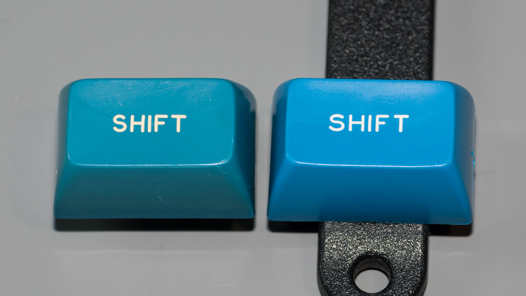 SHIF T<br />Signature Plastics SA family (from the Round4 group buy) [right] vs a Perkin-Elmer cap [left].