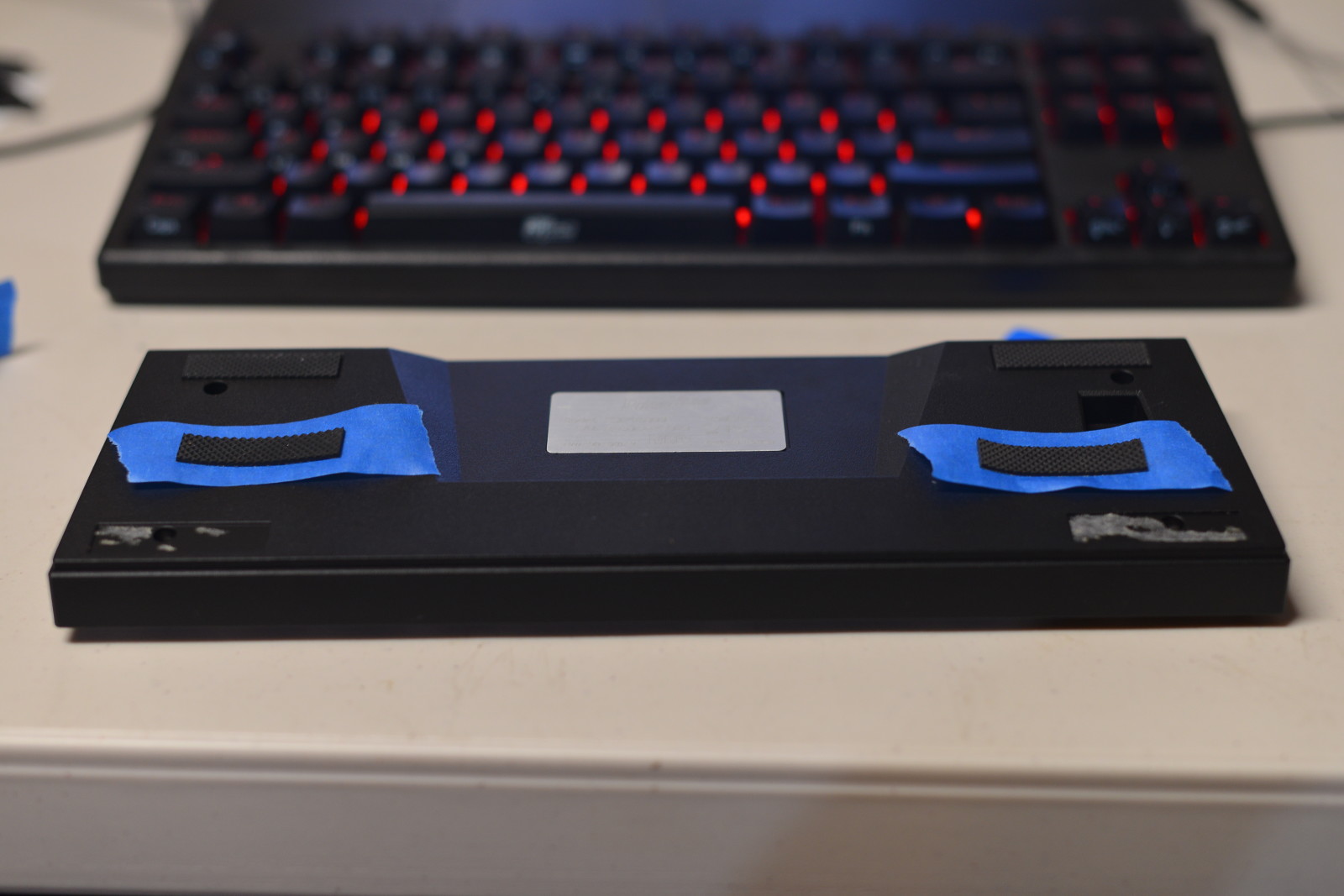 Two more screws hidden under the V60's front feet.