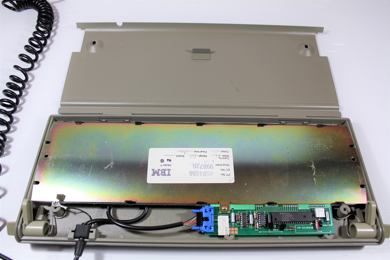 Industrial bottom case has a curved portion that stabilizes the keyboard mechanism from underside in the wrong place.