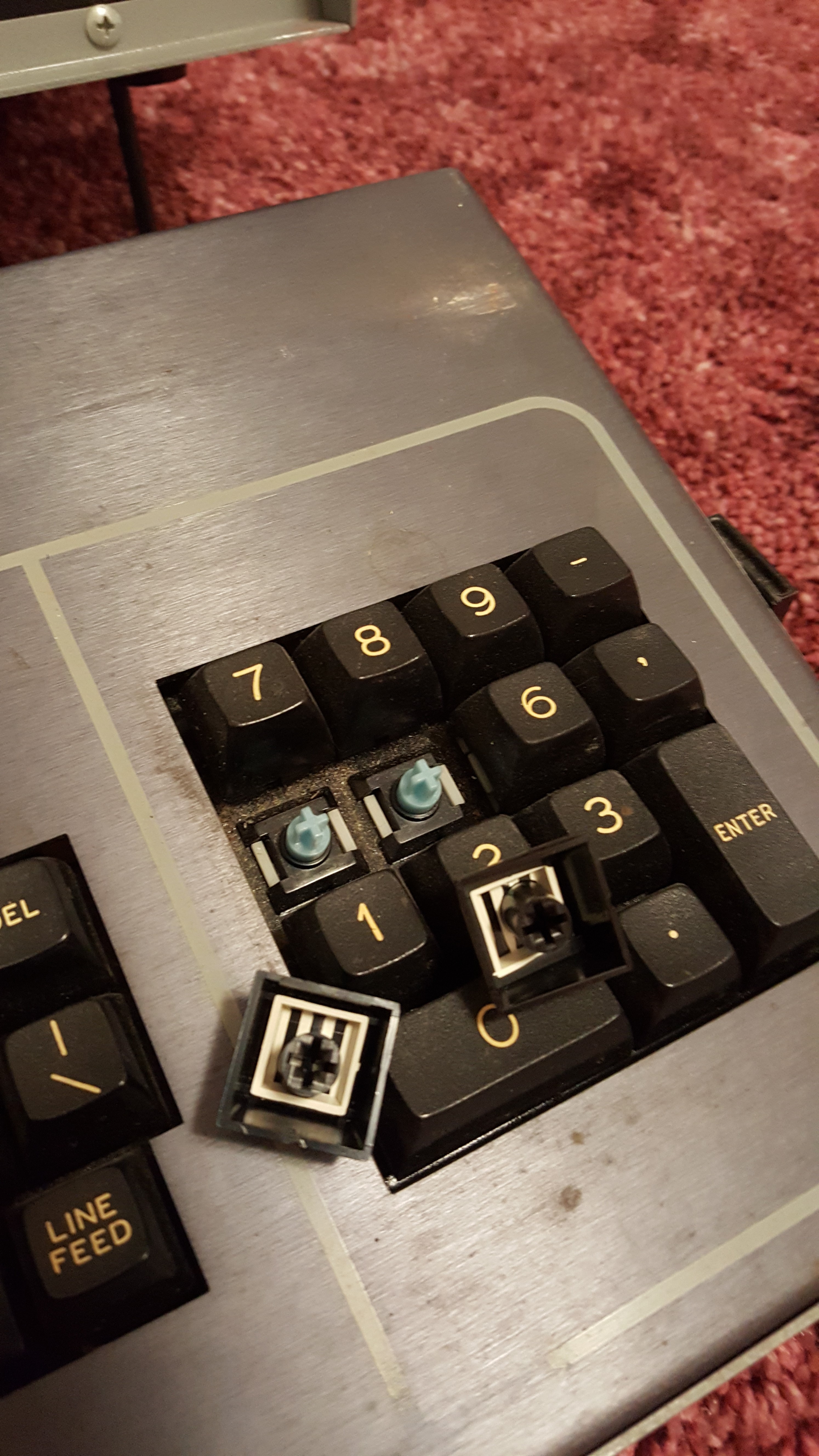 Could they be? Blue slider SMK Vintage Linears?? The Kaypro beside it has the normal black ones, and these feel identical. Also - the key caps are quite a bit thinner on this board.