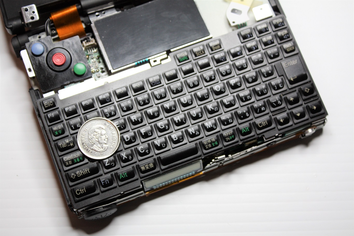 IBM PC110 - scale with quarter