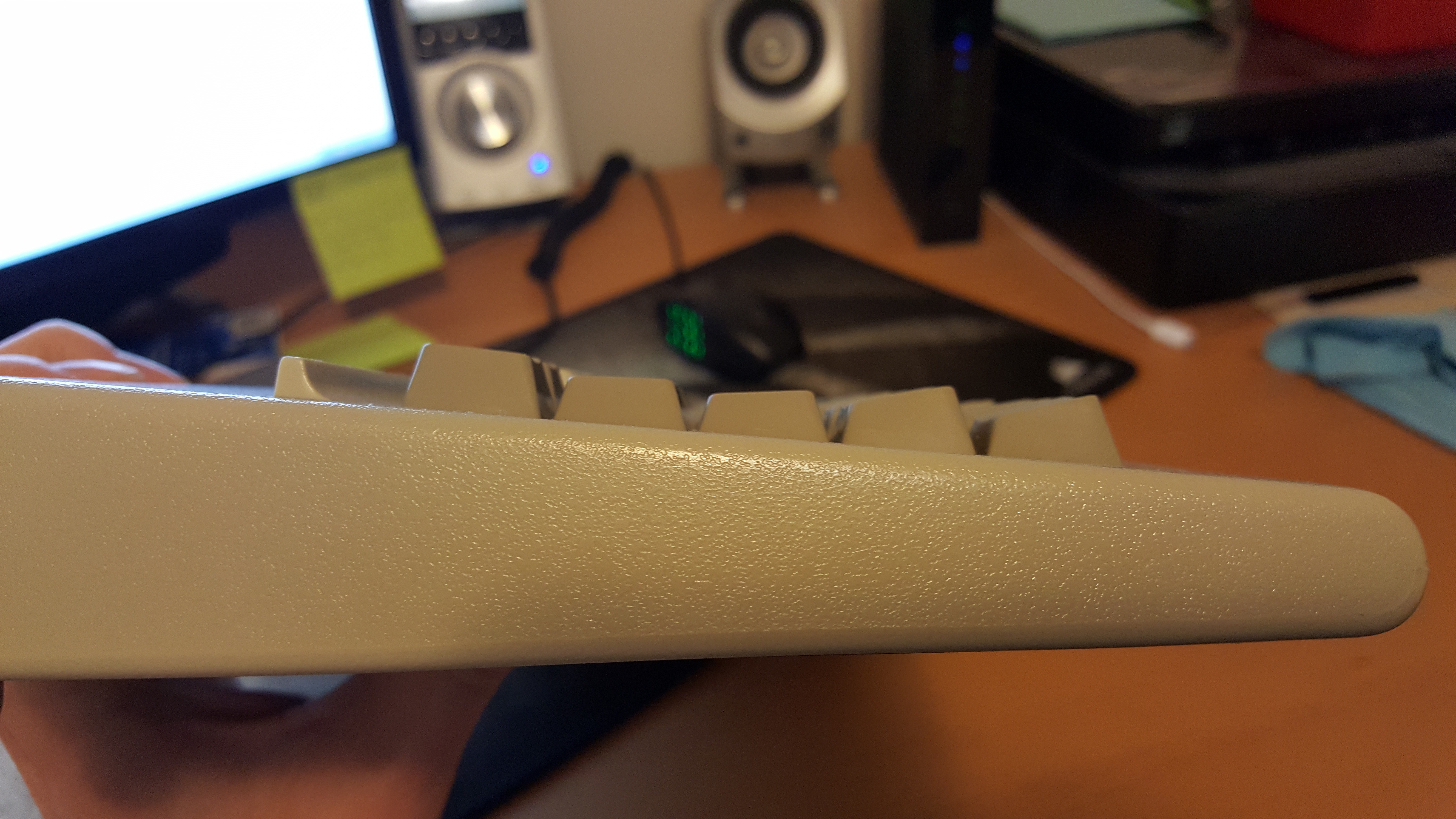 Key cap profile is apparent from the side view.