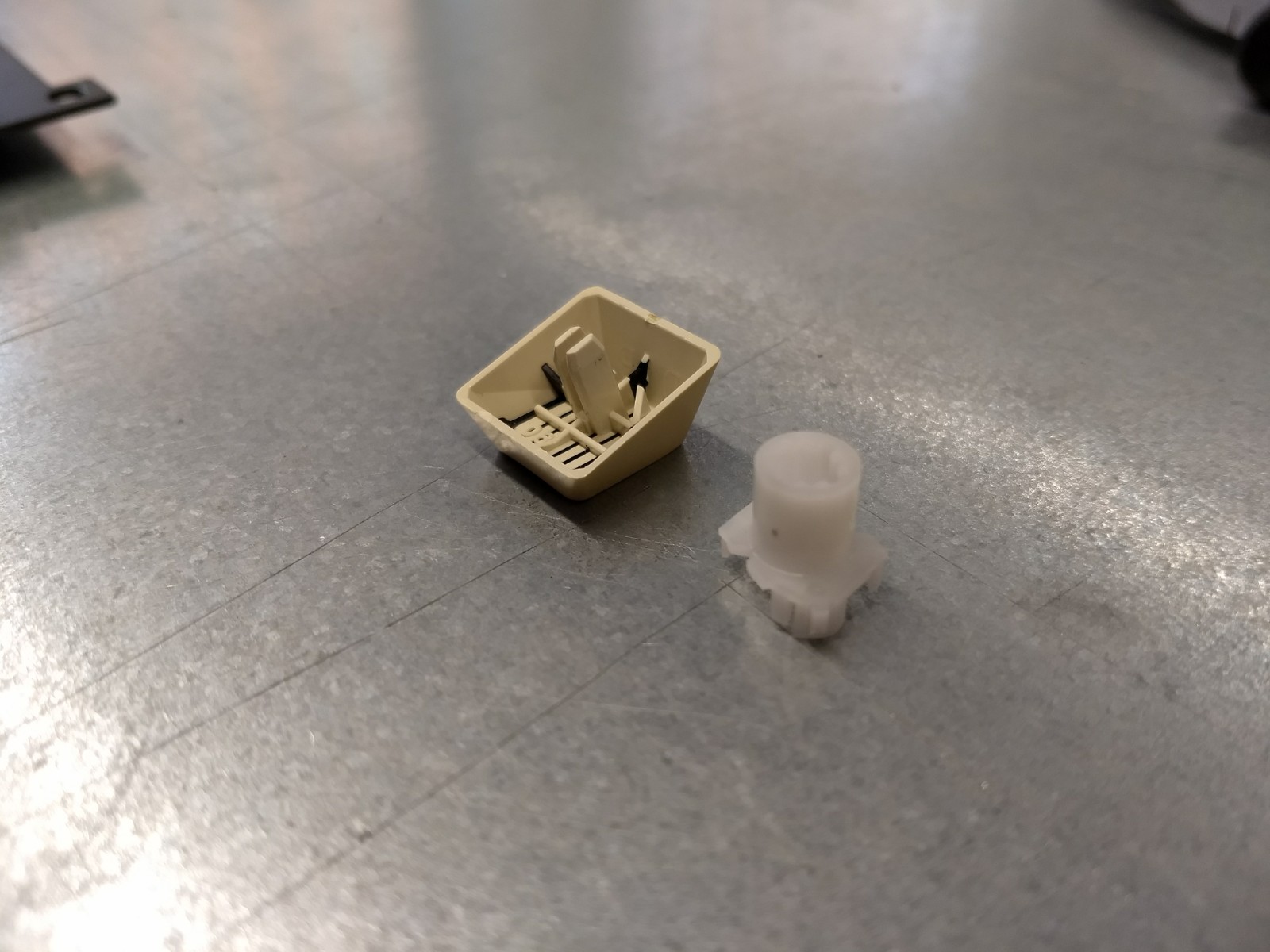 Keycap and slider. Note how tall the stem inside the cap is.