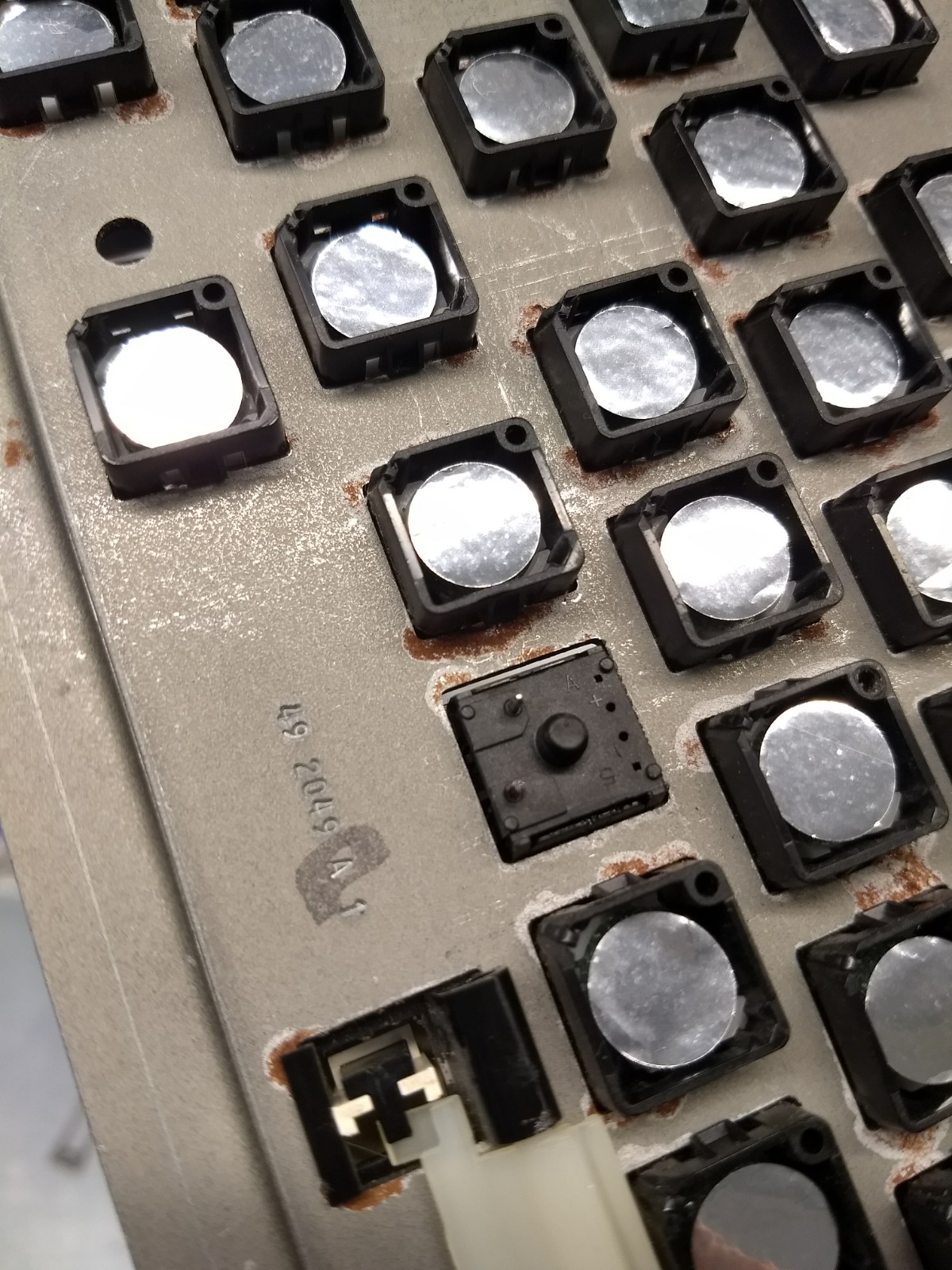 Kailh brown switch test fitted. Note the narrow slit. I'm hoping this is only b/c of some bent retainers on the switch itself..