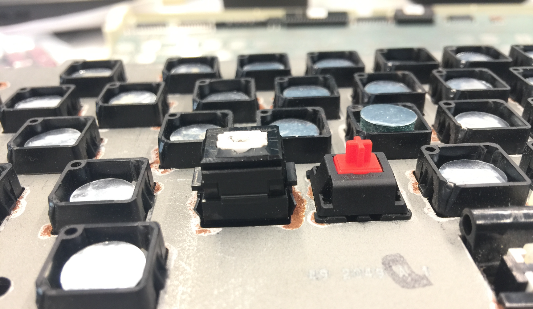 (Bothced) Alps switch vs. Cherry test fitted in the old plate of the board.