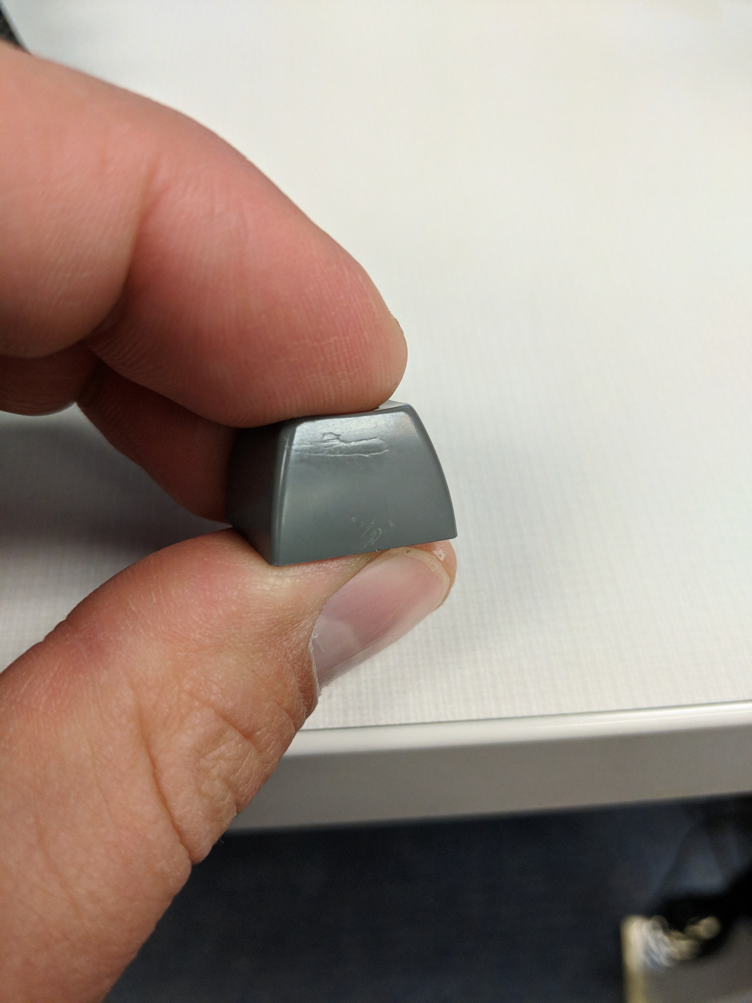 Here are a couple shots of the "bubble" I mentioned earlier - this is typical of this issue.  (I had these on my DangerZone caps, too)