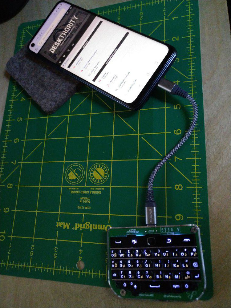 Connected to a phone by a very short USB cable