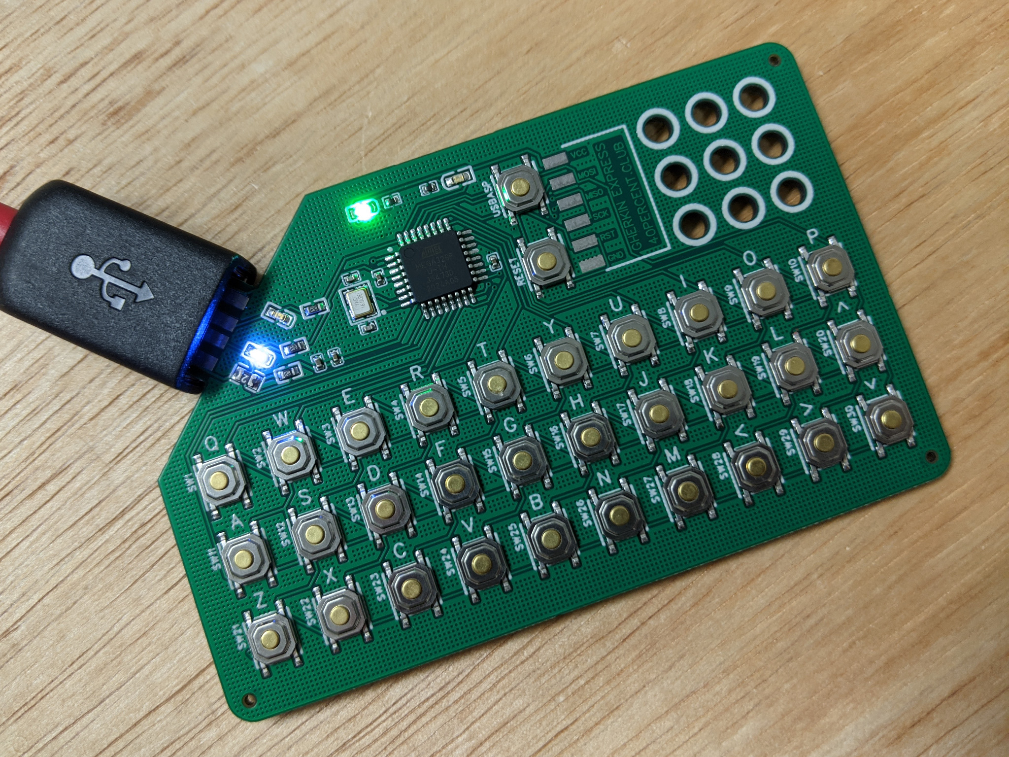 An altoids tin sized ortho keyboard that uses the board itself as a USB connector