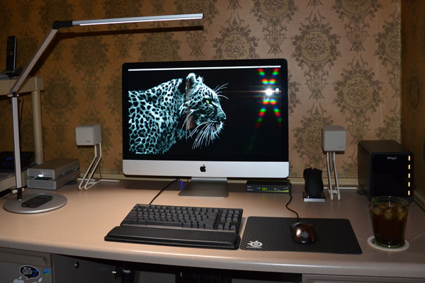 27" IMac with an OS X reflection.