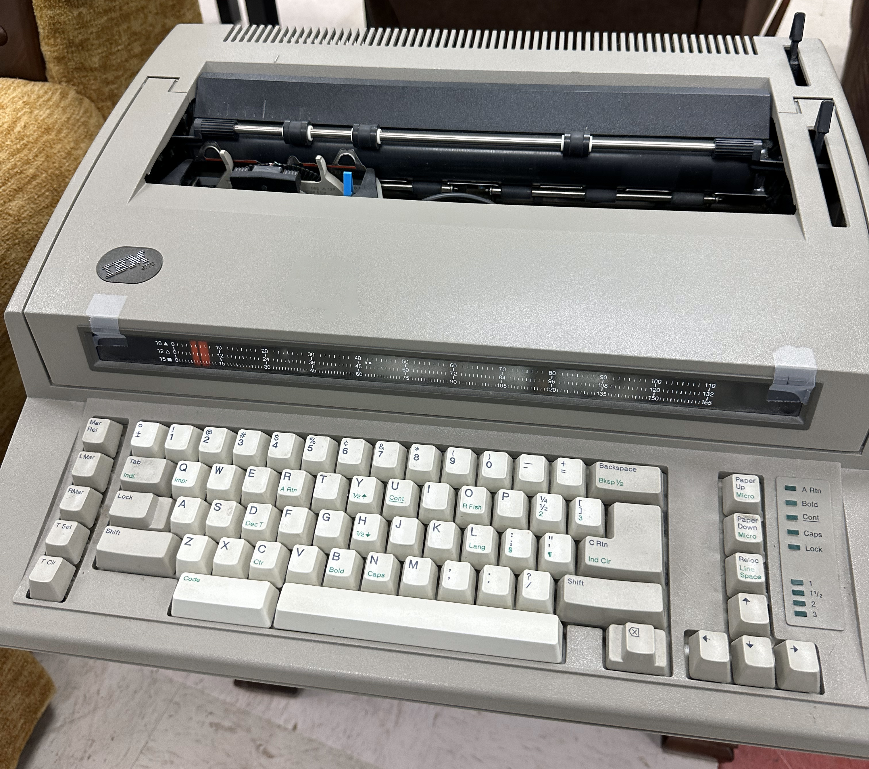 IBM 6779 typewriter in a light "military olive drab" colorway. Best guess on the mfg date is 1989. I don't use it as much as the WW3S2, but it's an interesting machine.<br /><br />.