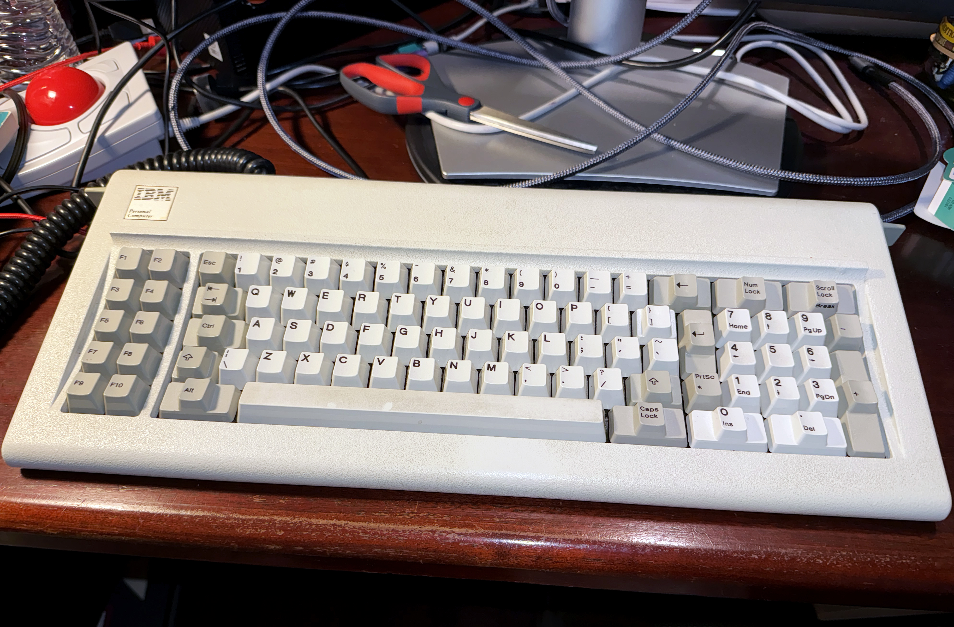 This one is first because it's my favorite. (I've passed on opportunities to own IBM beam spring keyboards. They were too expensive, and I couldn't find an example that was clean, functional, and fully converted for use on modern computers.)<br /><br />This is a 1981 model F ("IBM Personal Computer Keyboard"). Made in the USA. Unrestored. I did clean the case and barrel plate, and run the keycaps through an ultrasonic cleaner. My "daily driver" among any computer keyboard for everything but gaming. On an average day, this keyboard clocks in at 6 lbs (2,722 grams).<br /><br />.